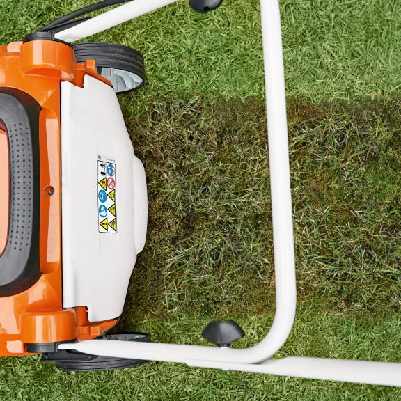 What is a lawn scarifier and how do I use it?